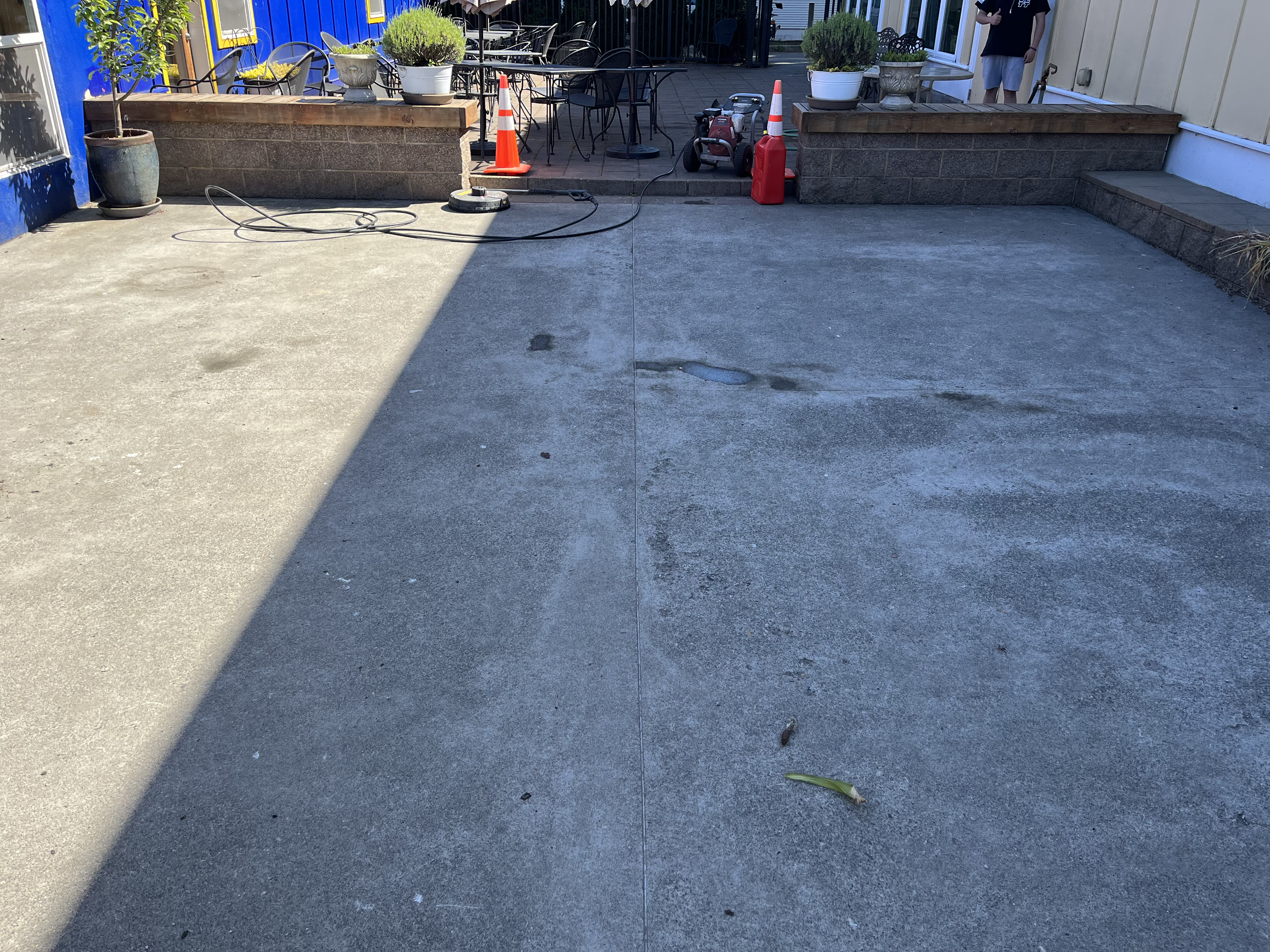 Strickland pressure washing before 12