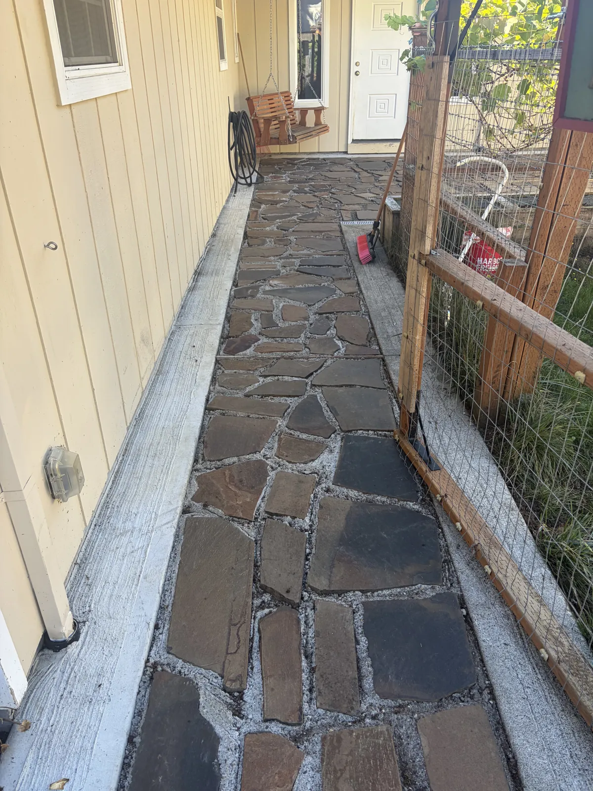 Flagstone walkway after pressure washing
